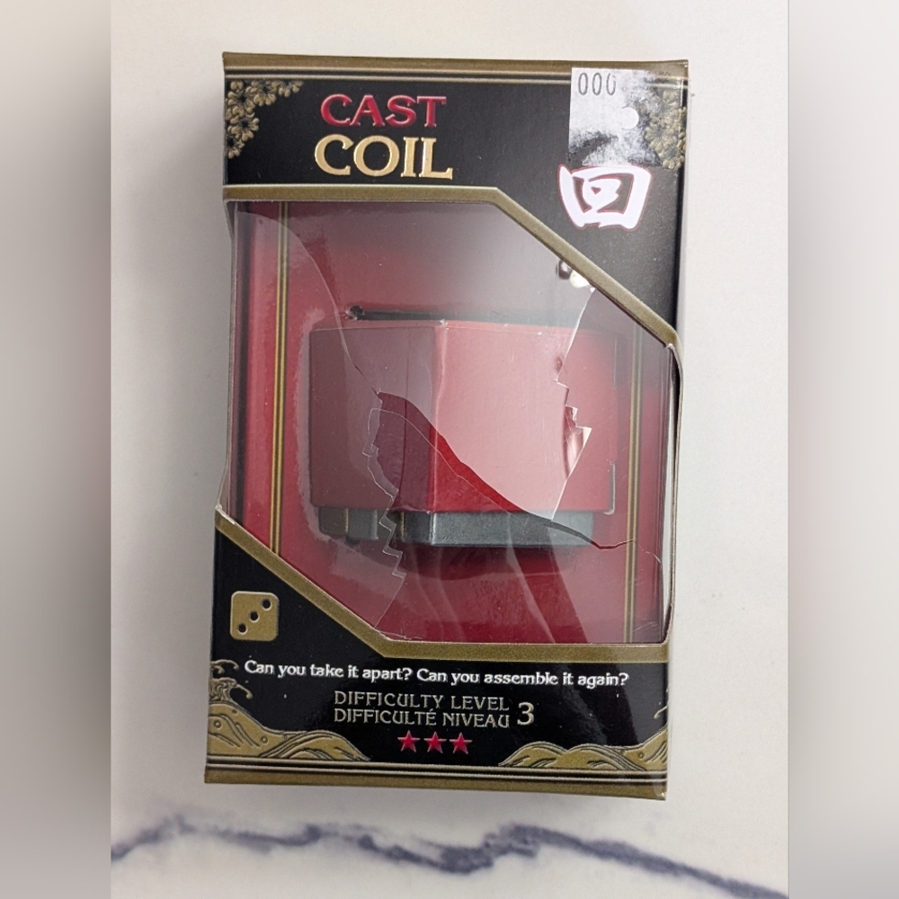 Red and Black Cast Coil Puzzle